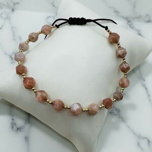 Sophisticated Gold and Brown Bracelet with Adjustable Fit